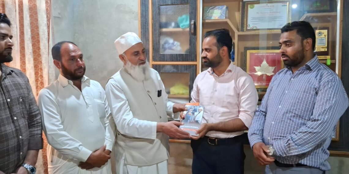 From New Delhi to Kashmir: PM Modi’s Delegation Honors Social Activist Muzamil Mehmood with Special Book