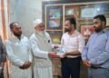 From New Delhi to Kashmir: PM Modi’s Delegation Honors Social Activist Muzamil Mehmood with Special Book