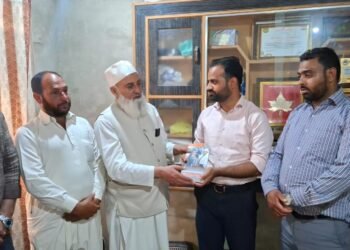 From New Delhi to Kashmir: PM Modi’s Delegation Honors Social Activist Muzamil Mehmood with Special Book